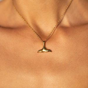 whale-tail-necklace-on-model.jpg